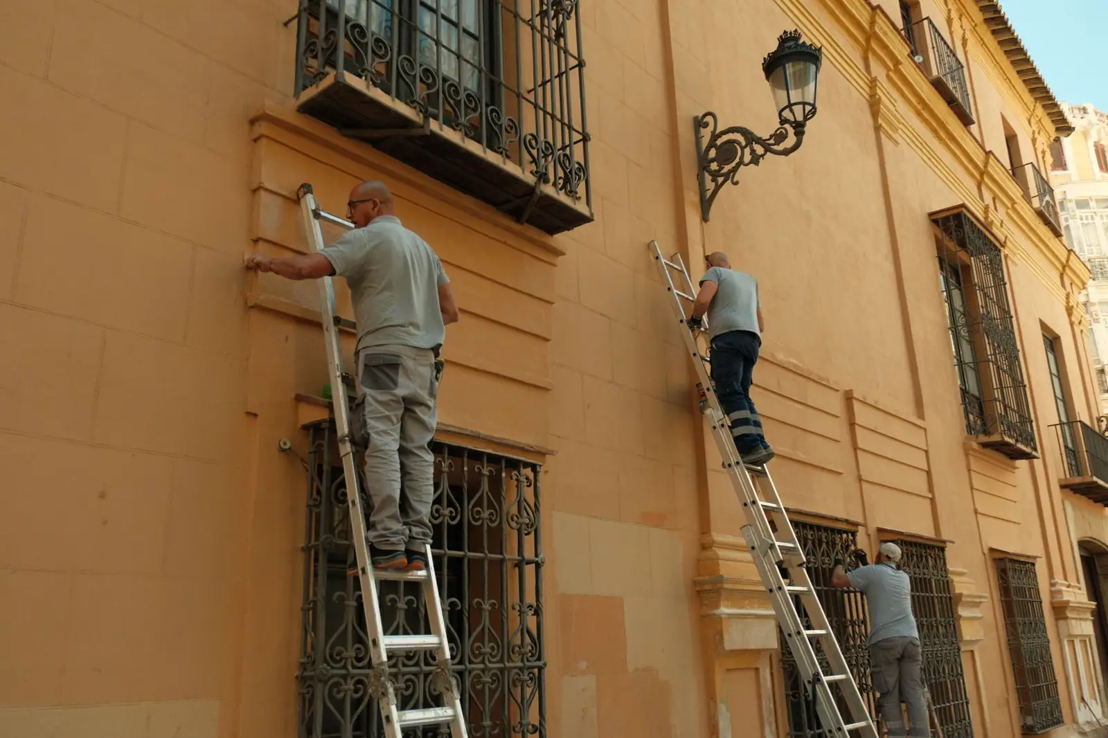 Crew working a building facade