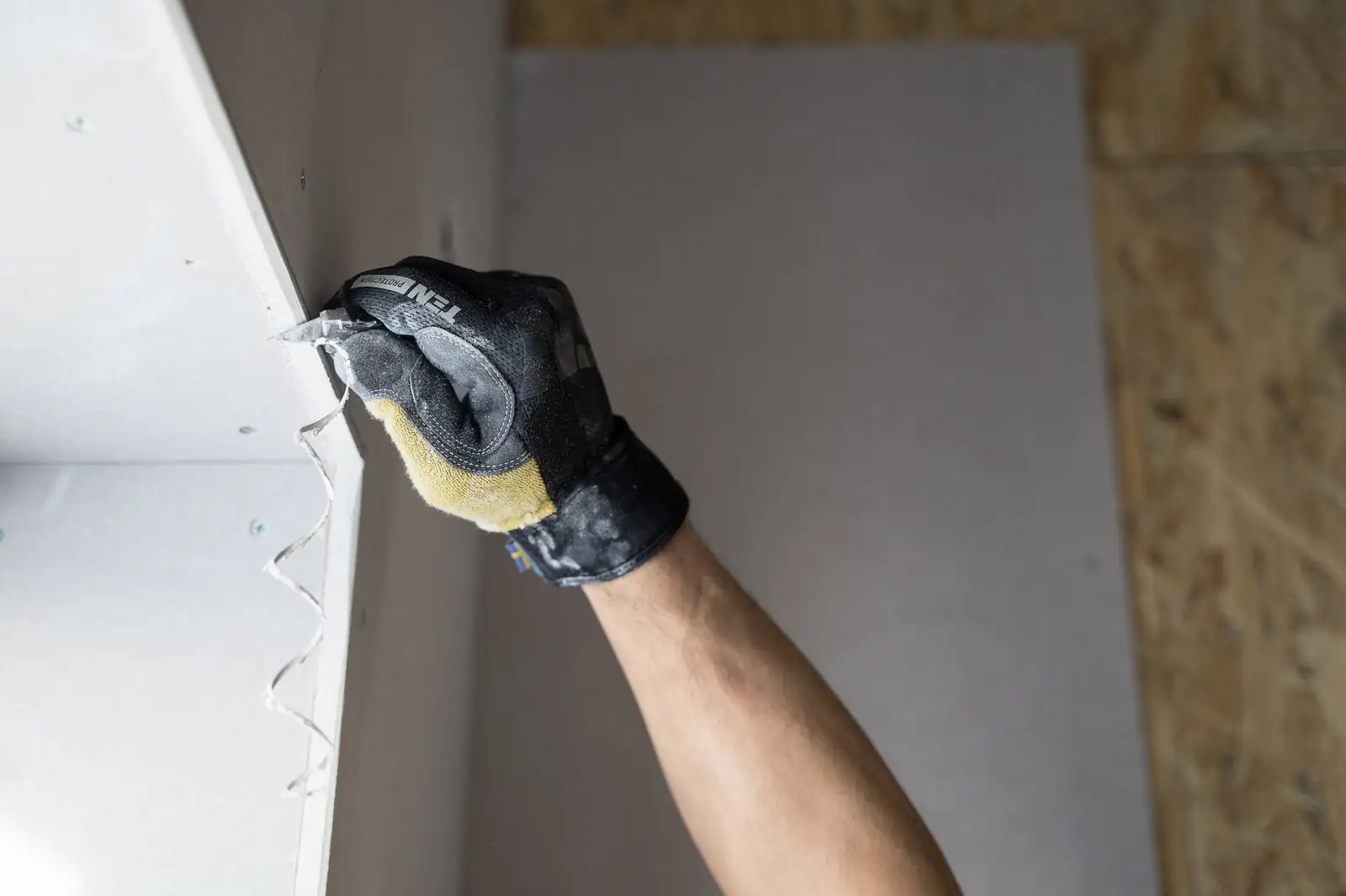 Plaster patching a wall