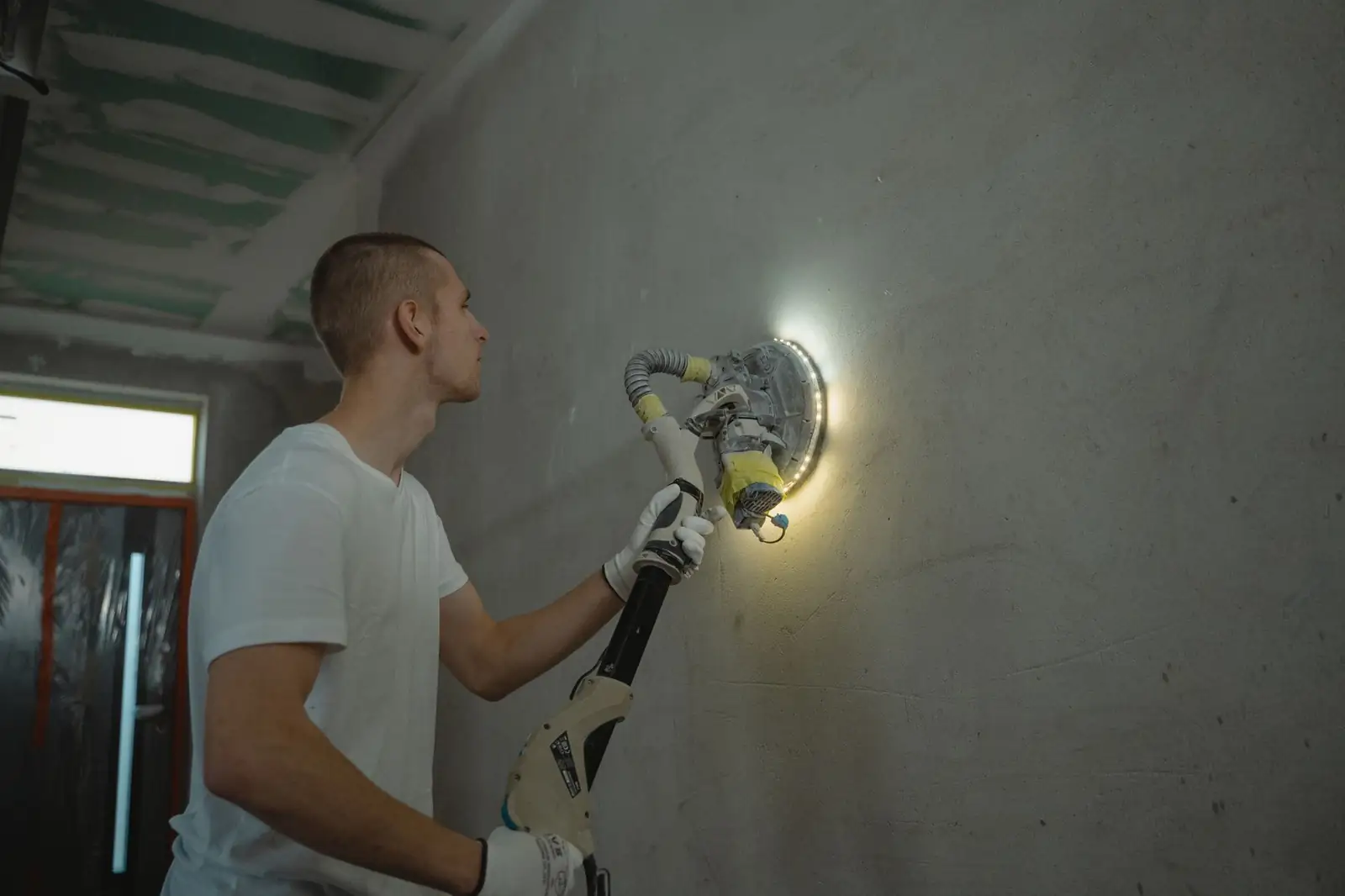 Sanding a drywall surface
